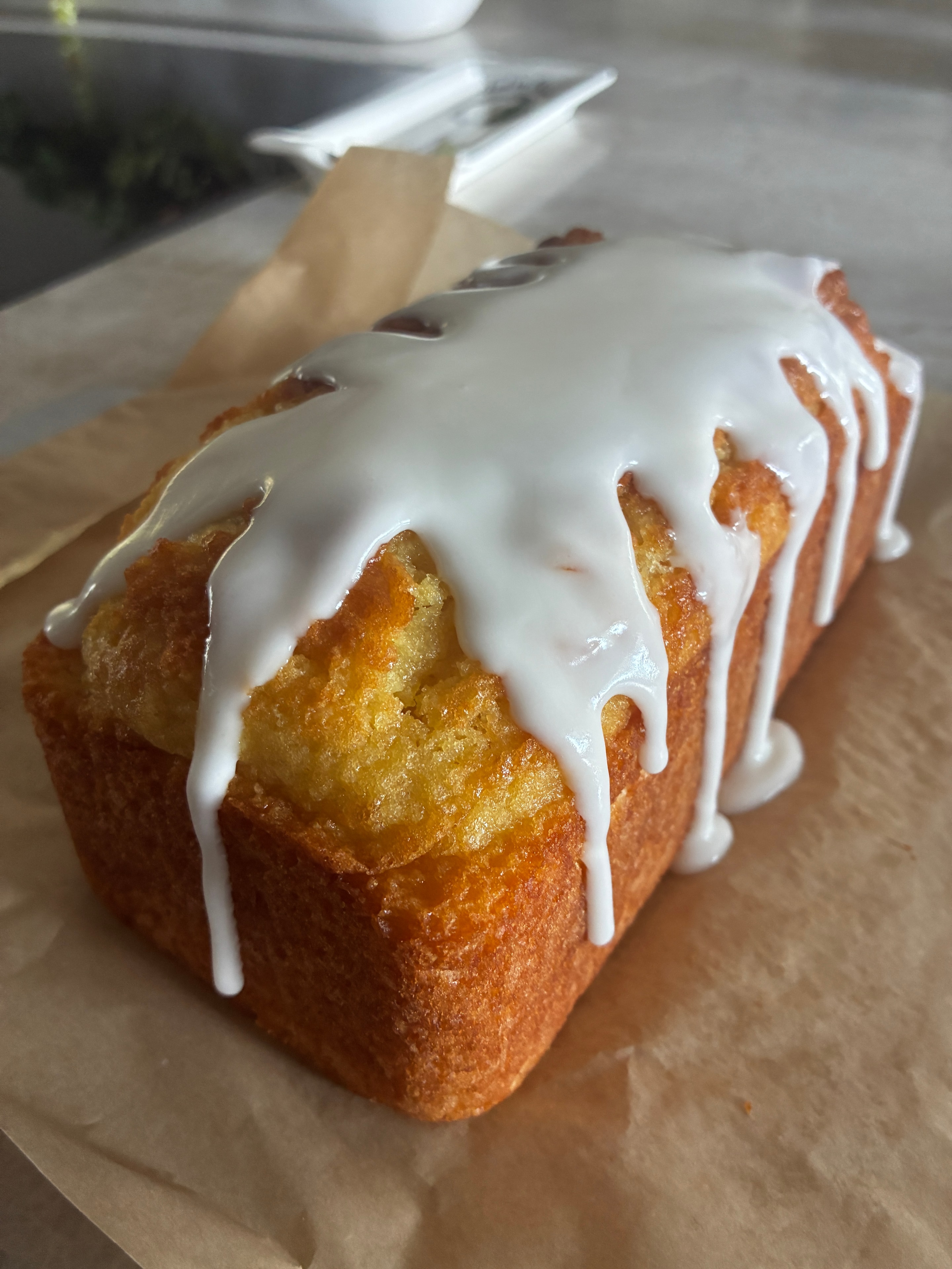 A glazed lemon loaf cake — handmade by Cowgirl Desserts